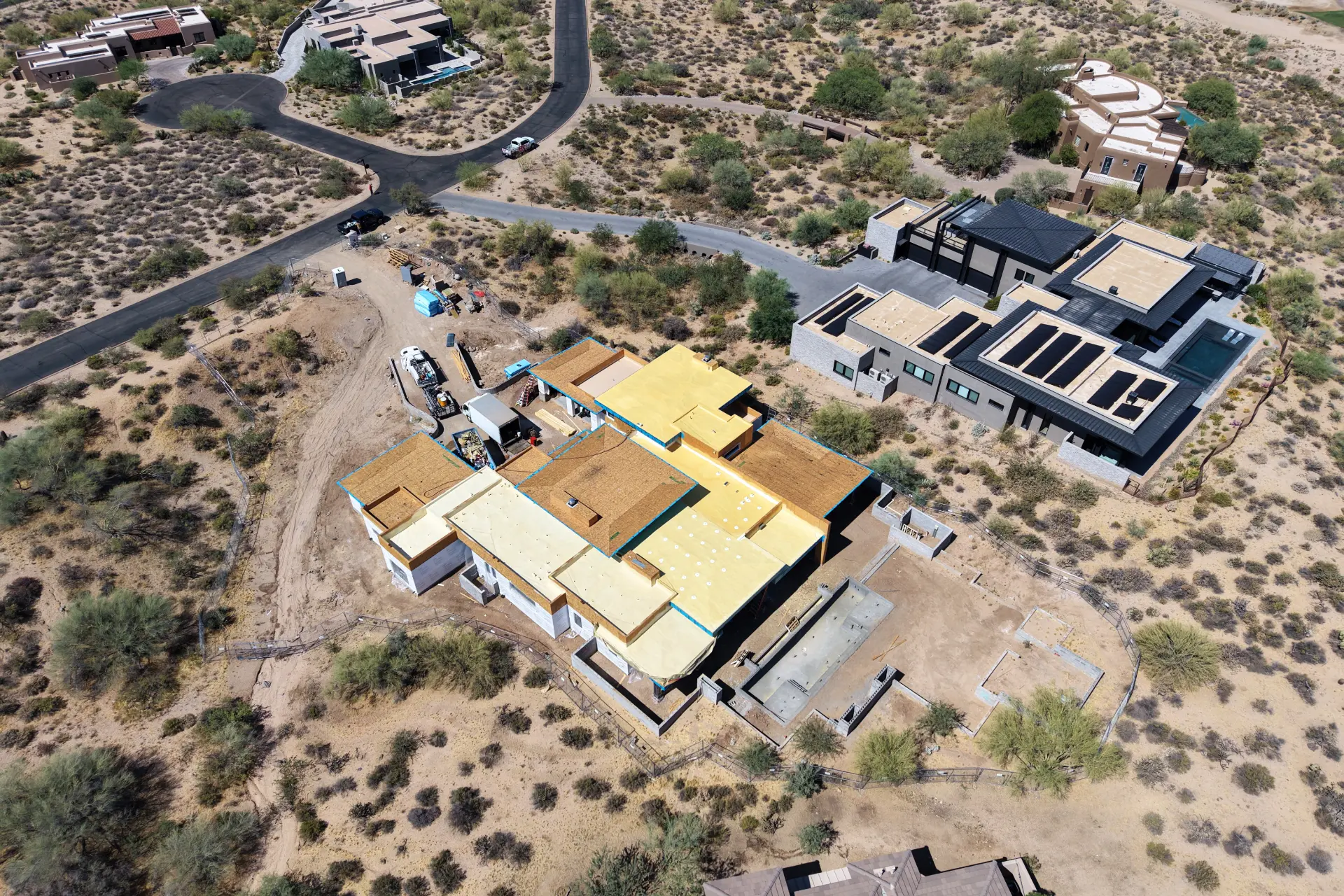 Aerial of a foam roof install on a new home